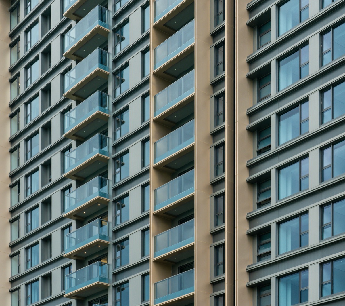 Modern apartment building exteriors representing group and multi-unit lodging capacity