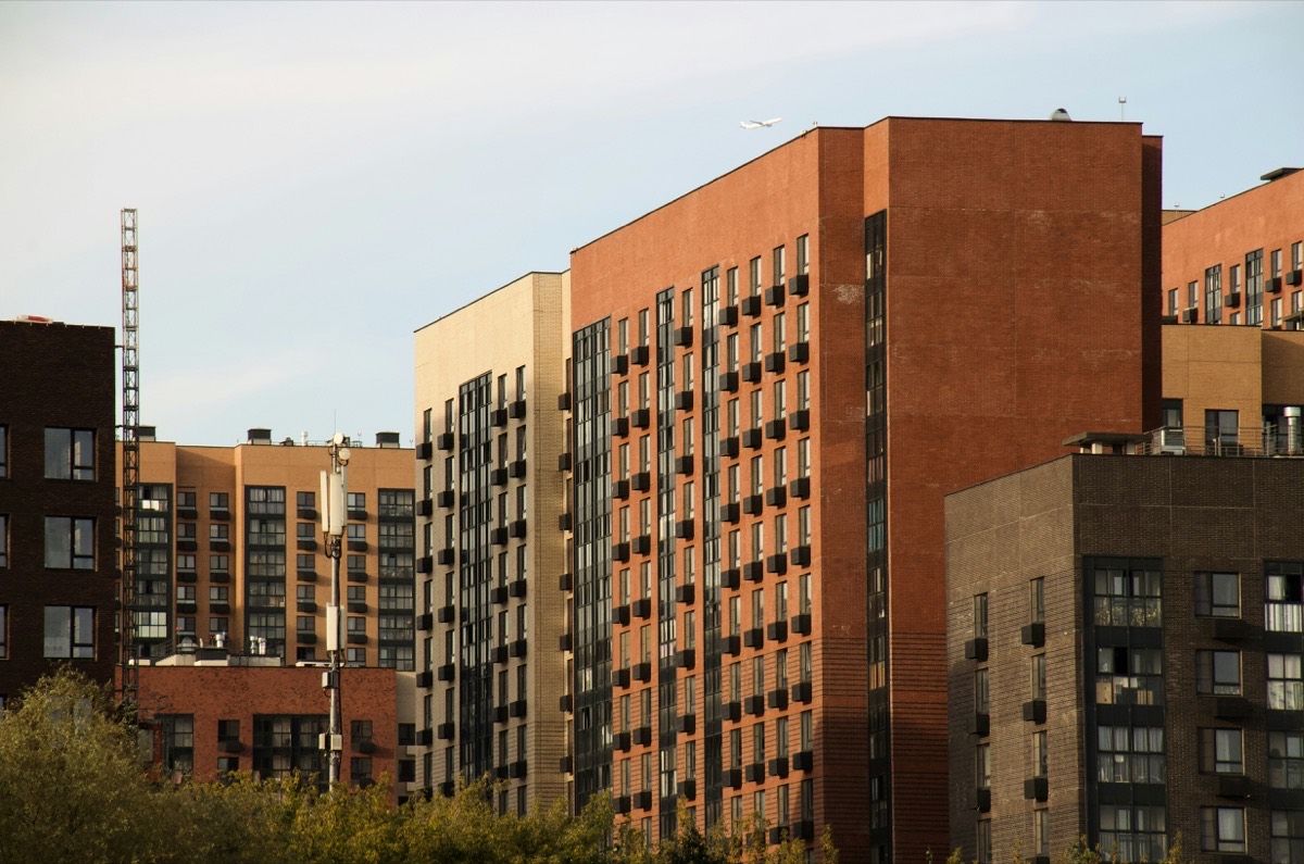 Multiple residential buildings representing multi-unit and group lodging capacity